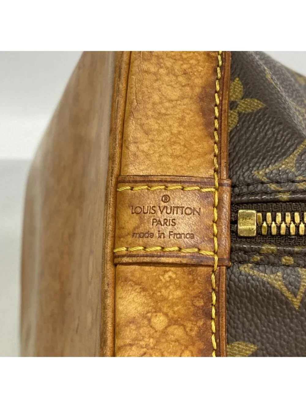 Louis Vuitton Monogram Alma Brown Handbag